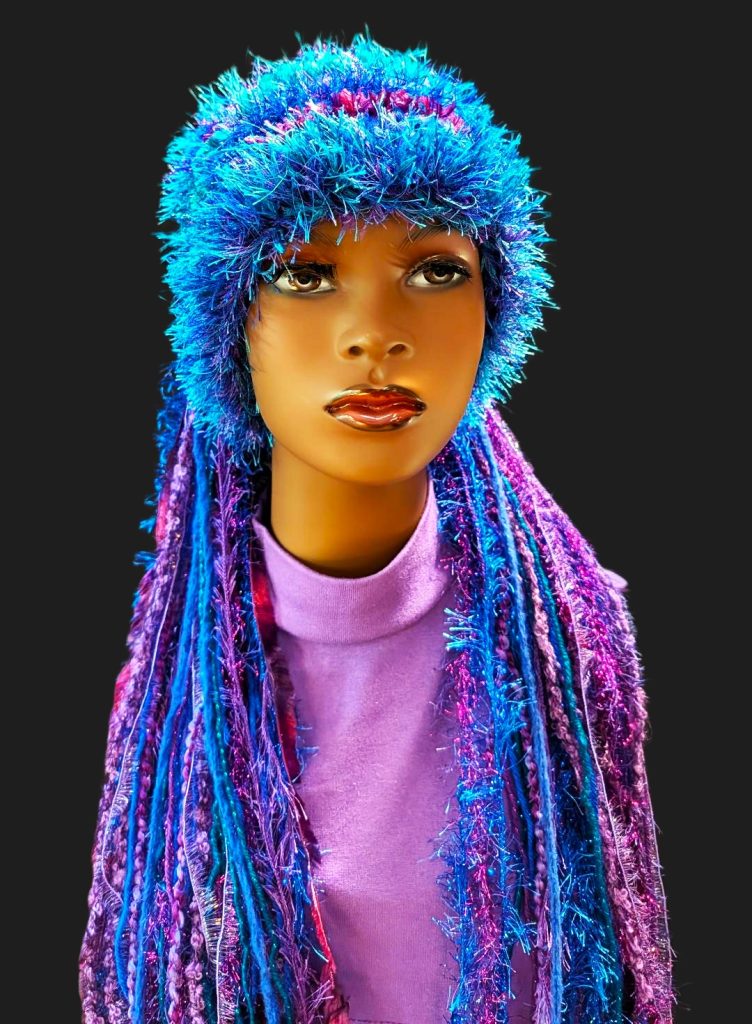 Crocheted Bright Slouchy Beanie Hat in Blue-Purple-Teal with Sparkle, Texture, Fur & Long Tail Fringe. Front View.