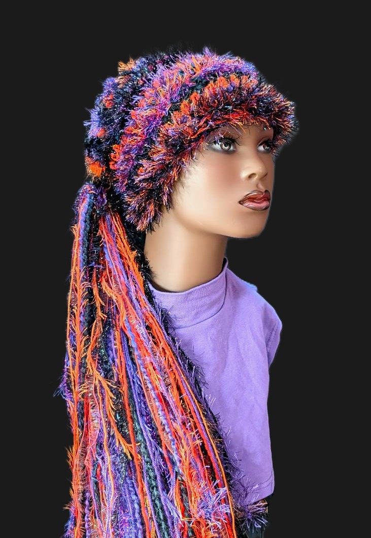 Black, Purple & Orange Halloween Slouchy Beanie Hat with Sparkle, Texture, Fur & Long Tail Fringe. View of Head & Torso showing entire hat length.