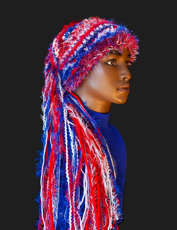 Bright Red, White & Blue Slouchy Beanie Hat with Sparkle, Texture, Fur & Long Tail Fringe. View of Head & Torso.