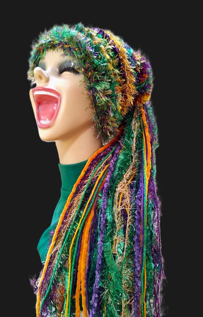 Bright Purple, Green & Gold Slouchy Beanie Hat with Sparkle, Texture, Fur & Long Tail Fringe. Side View.